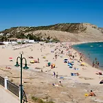 Casa Juju - Férias em familia em apartamento com piscina perto da praia