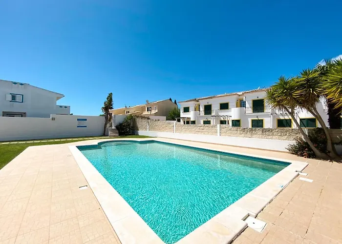 Casa Juju - Férias em familia em apartamento com piscina perto da praia