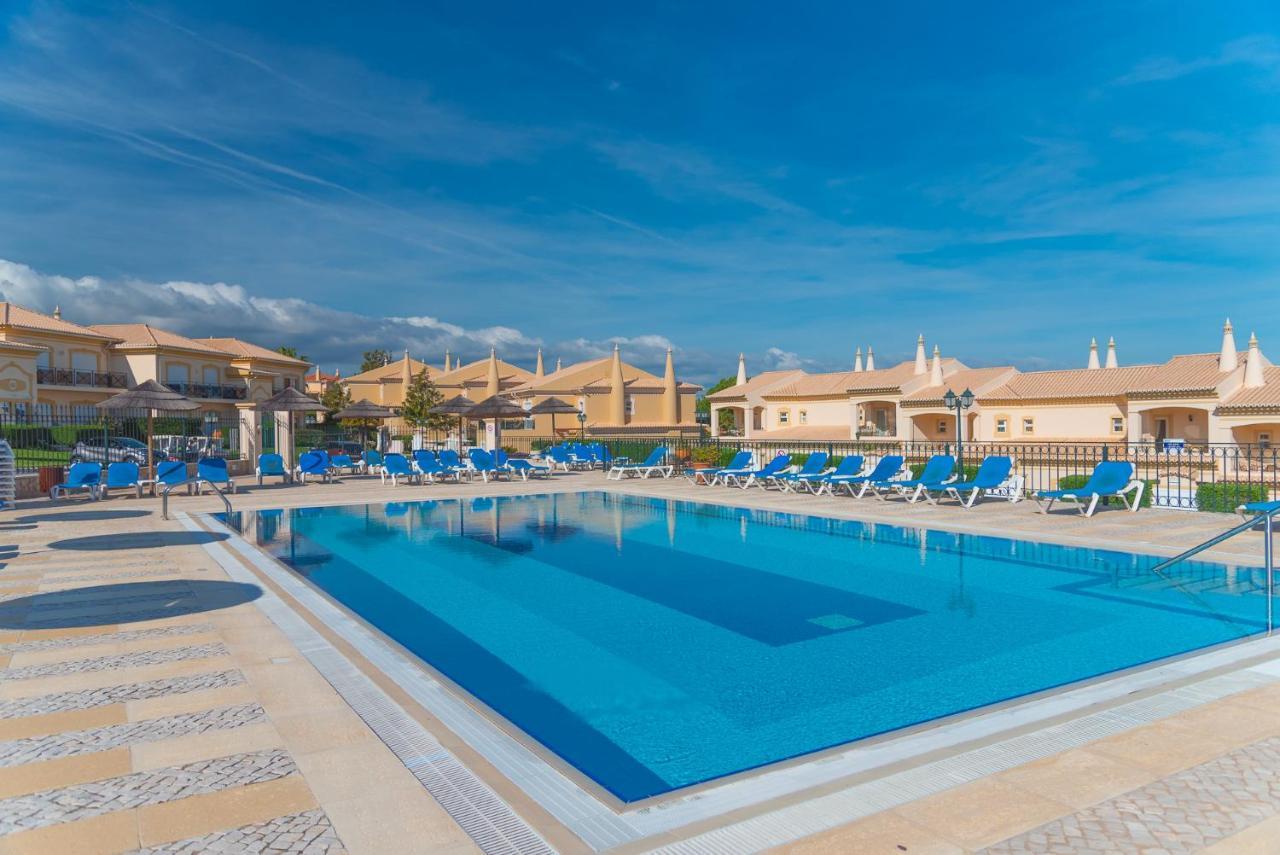With Sunny Patio Boavista Golf &