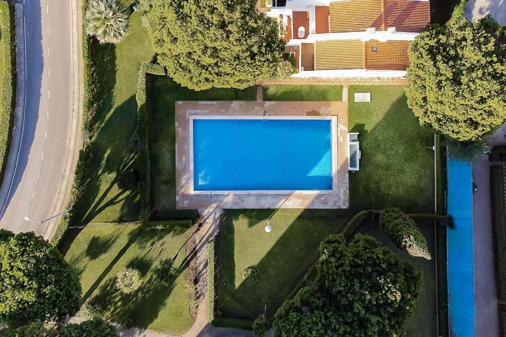 Heaven's Paradise-pool-sunset-1br *