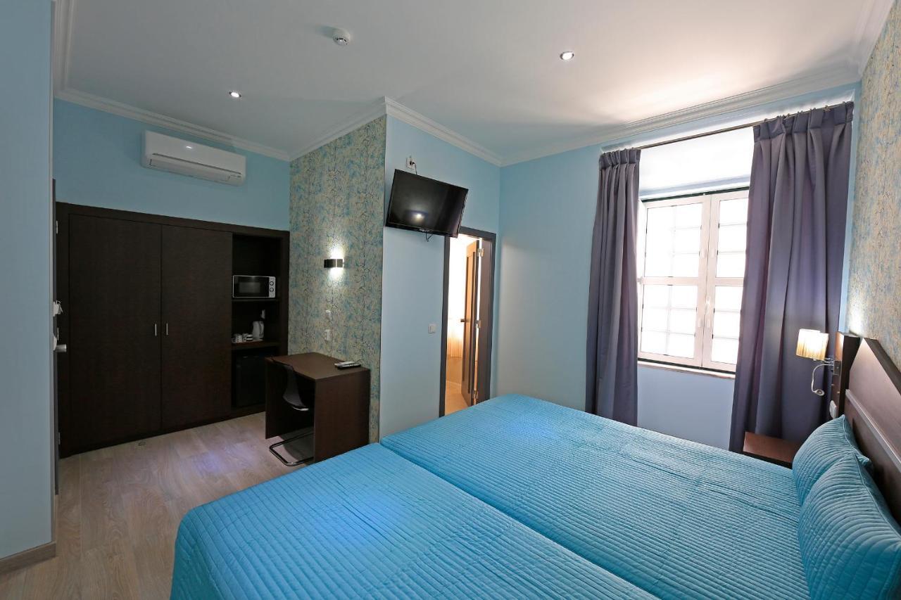 Guest house Pensao Praca Da Figueira 3*