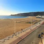 Sunset Terrace - Beachfront Apartment With Private Parking