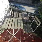 Apartment With Balconies And Garden