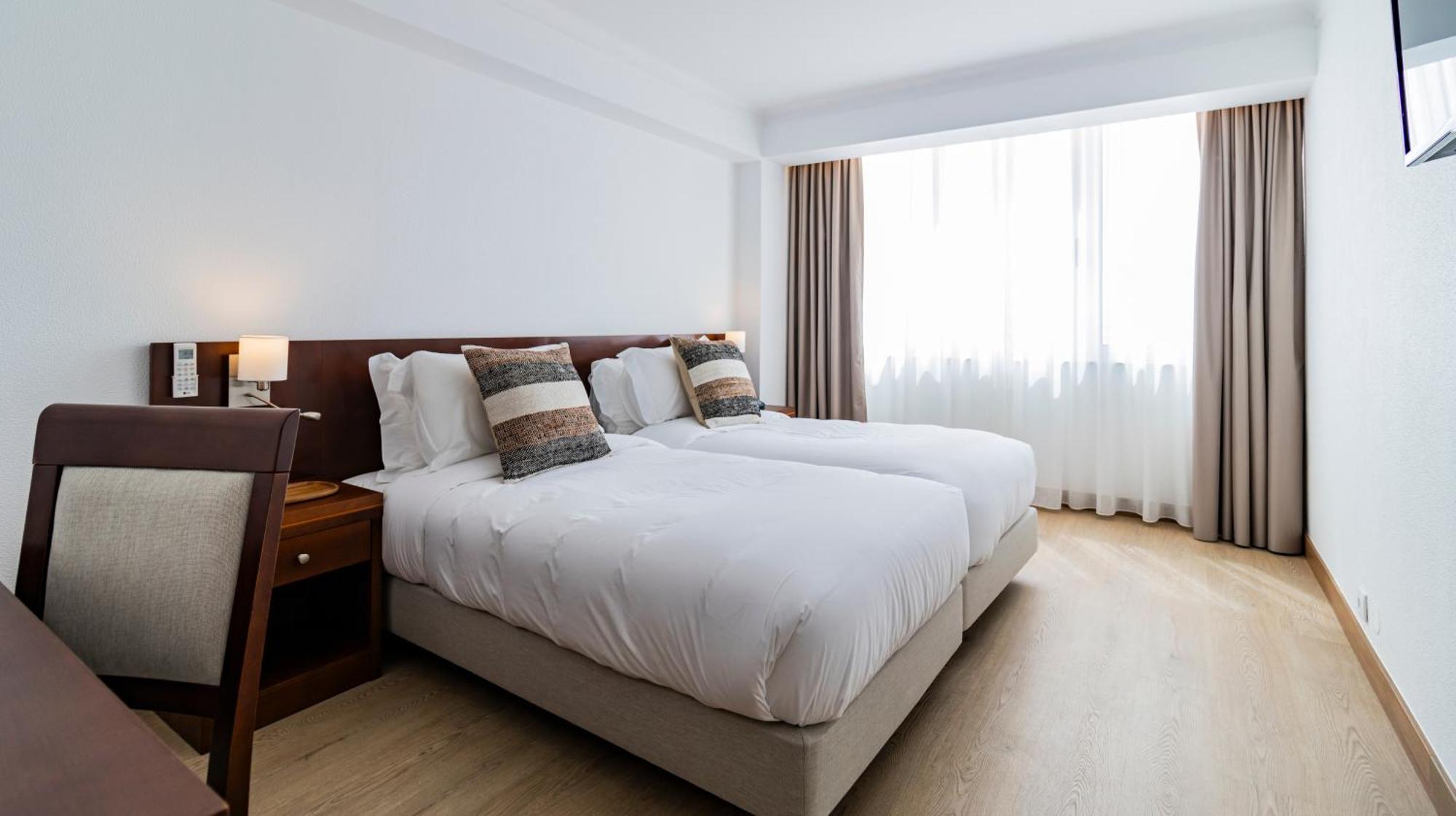 Hotel Albergaria Quim Barreiros 3*