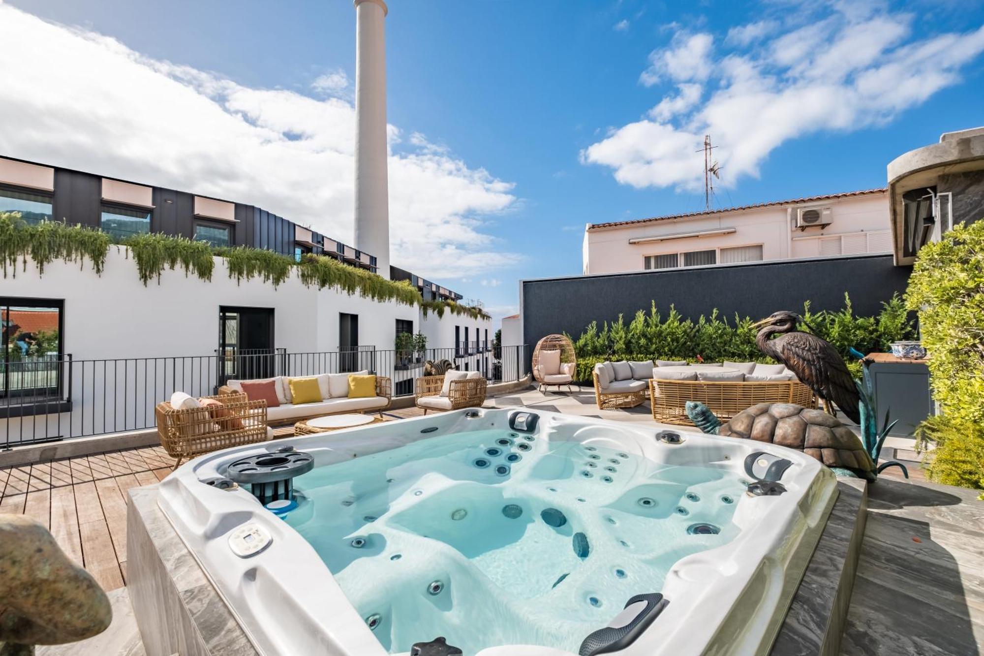 Jacuzzi, Terrace & Infinity Pool At Savoy Insular