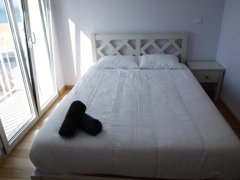 Apartment Bed & Seaside